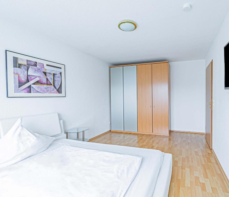 Postel nebo postele na pokoji v ubytování Hotel Tannenblick