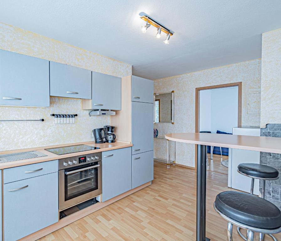Kuchyň nebo kuchyňský kout v ubytování Hotel Tannenblick