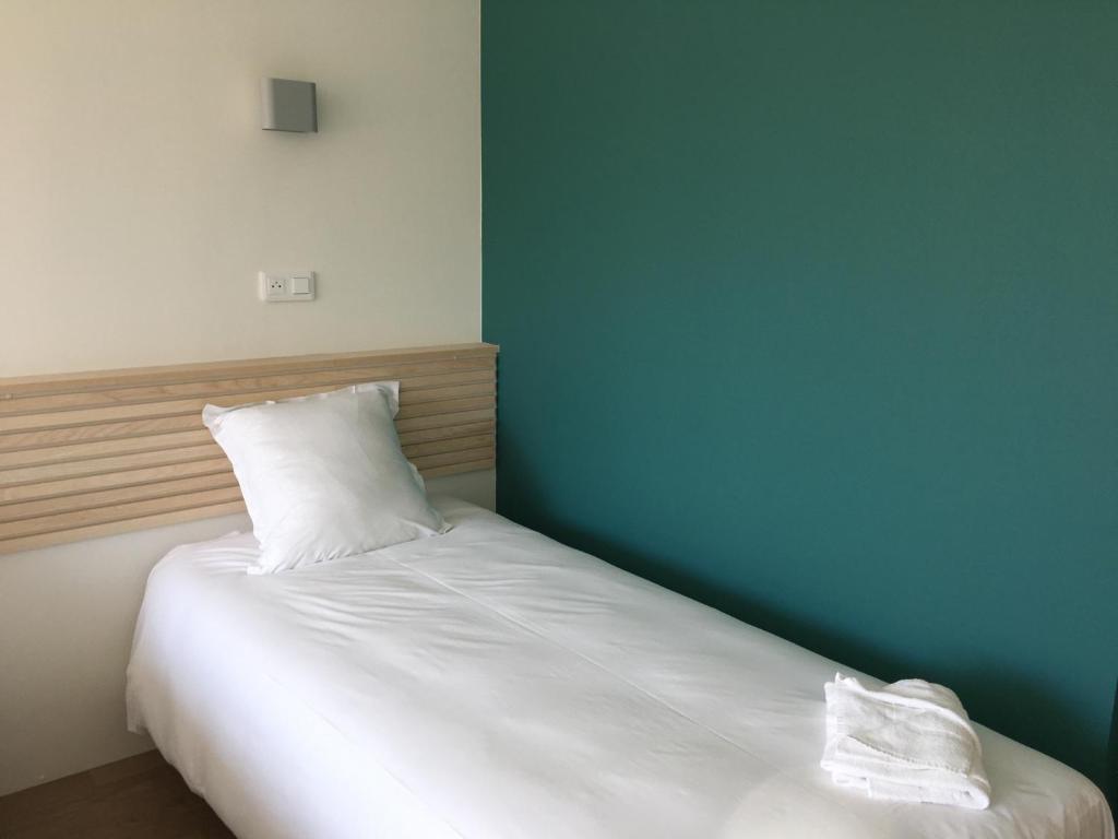 Postel nebo postele na pokoji v ubytování La Résidence du Parc d'Olhain