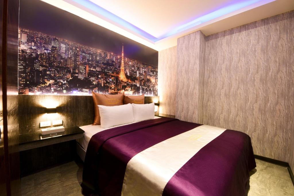 Postel nebo postele na pokoji v ubytování I-Like Motel