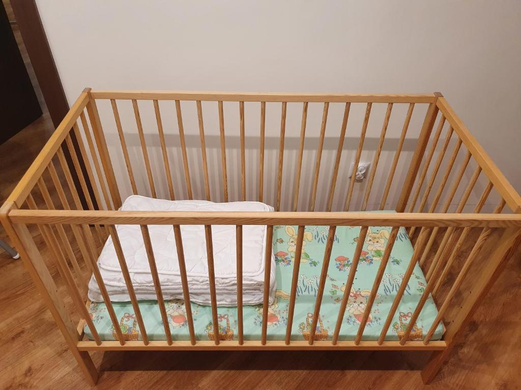 Posteľ alebo postele v izbe v ubytovaní Apartament w centrum