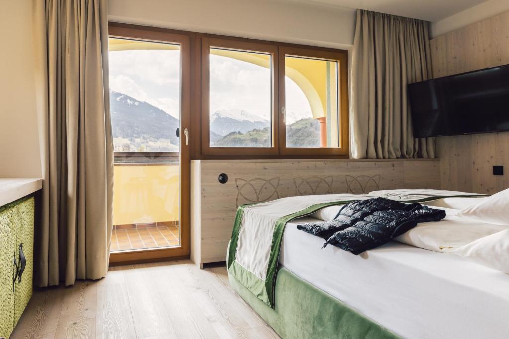 Postel nebo postele na pokoji v ubytování Hotel Jägerhof