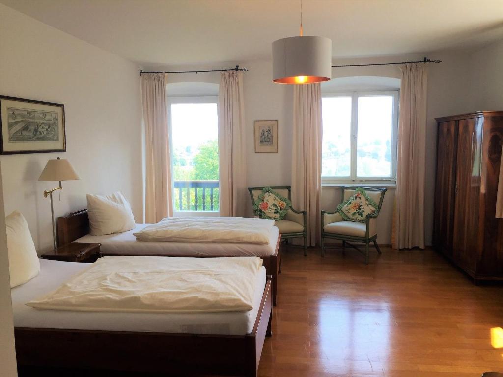 Postel nebo postele na pokoji v ubytování Villa Sawallisch