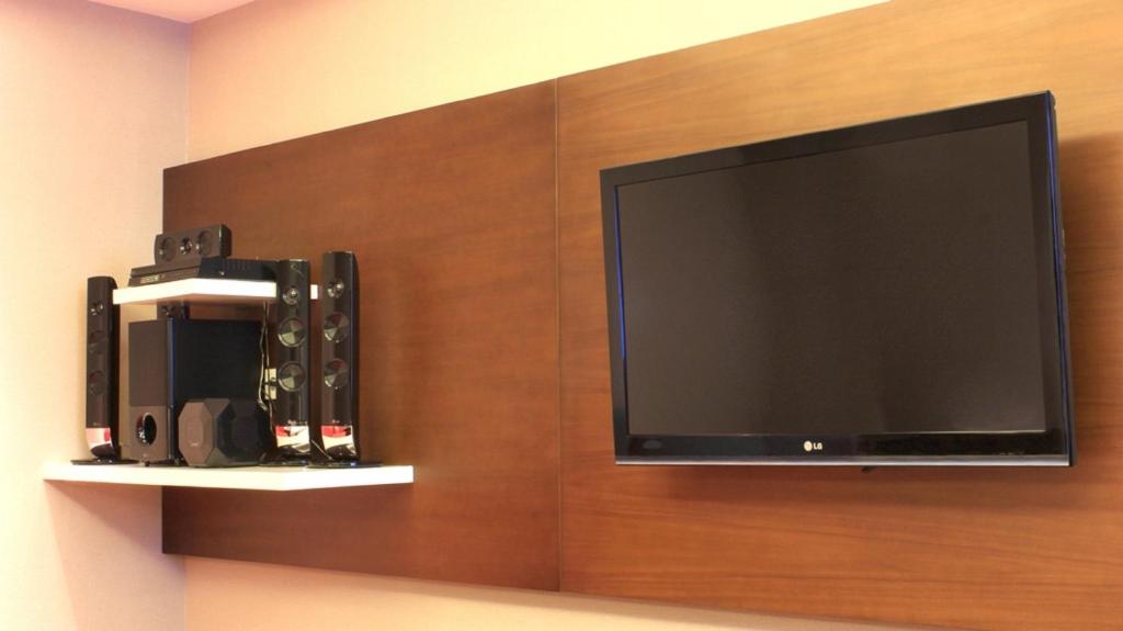 TV a/nebo společenská místnost v ubytování ASTON Pluit Hotel & Residence