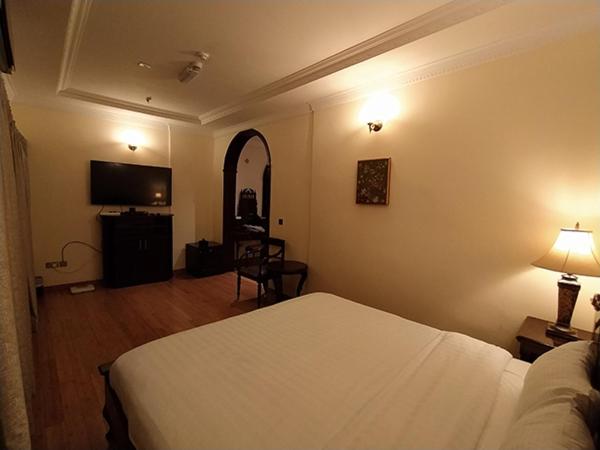 Katil atau katil-katil dalam bilik di Al Khariss Hotel