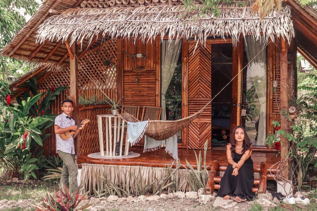 Os clientes hospedados em Tongo Hill Cottages