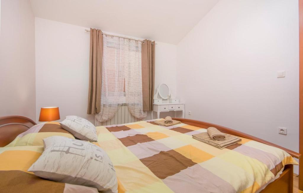 Postel nebo postele na pokoji v ubytování City Centre Sea View Apartment