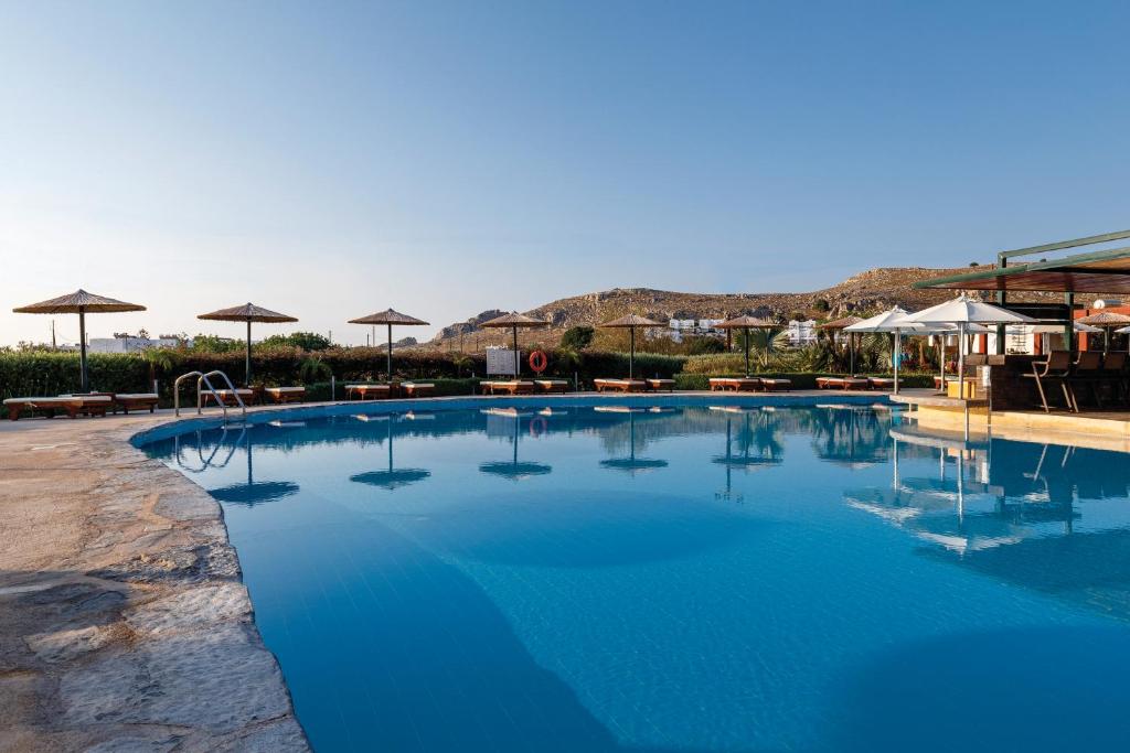 Bazén v ubytování LINDOS GARDENS RESORT COMPLEX nebo v jeho okolí