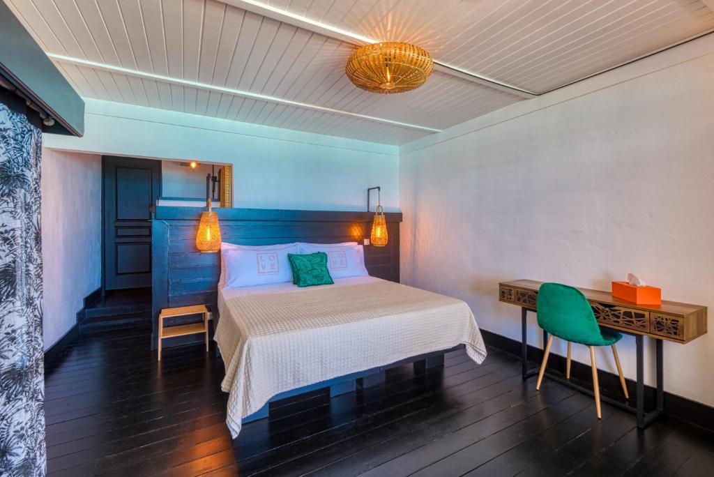 Postel nebo postele na pokoji v ubytování Love Boutique Hotel