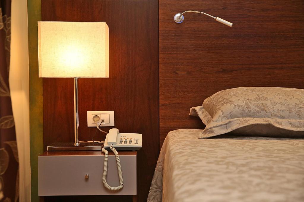Postel nebo postele na pokoji v ubytování AlAshrafia Smart Residence