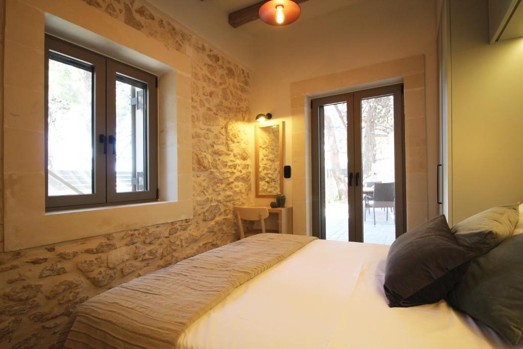 Postel nebo postele na pokoji v ubytování Villa Pefka, By Hellocrete
