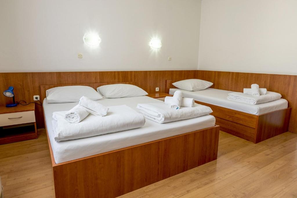 Postel nebo postele na pokoji v ubytování Hotel Porto