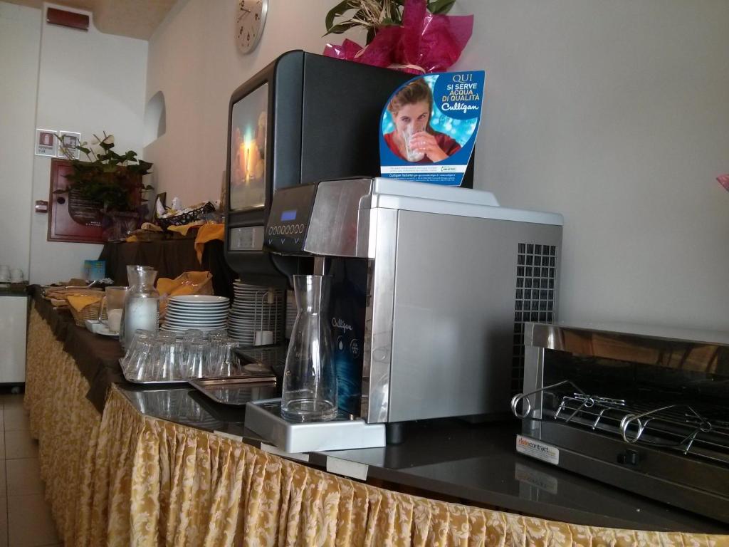 Kuchyň nebo kuchyňský kout v ubytování Hotel Sant'Elena