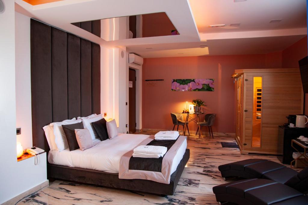 Postel nebo postele na pokoji v ubytování Hotel Ibisco Suites & Relax
