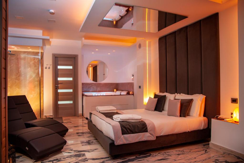 Postel nebo postele na pokoji v ubytování Hotel Ibisco Suites & Relax