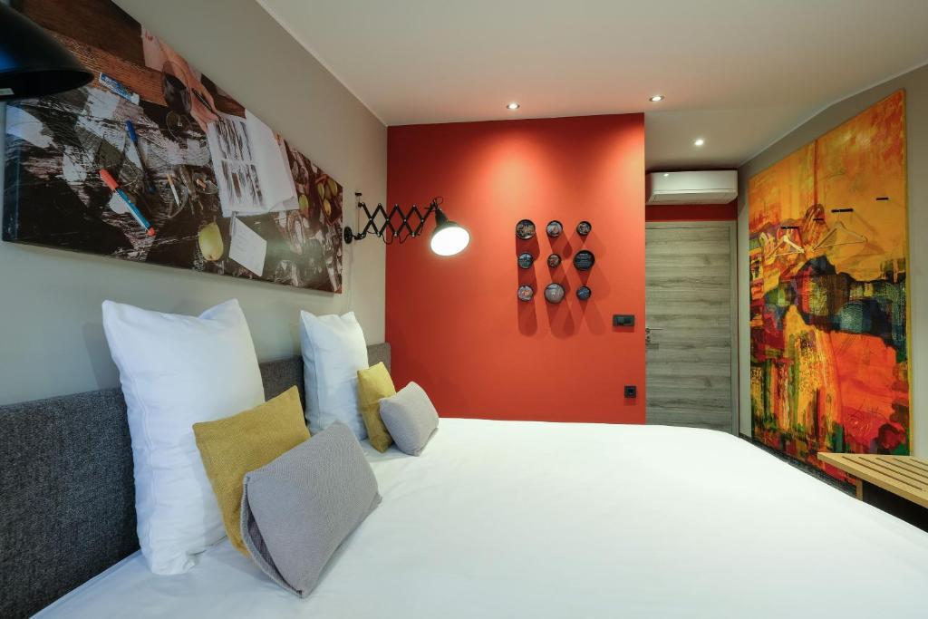 Postel nebo postele na pokoji v ubytování Hotel Kunst