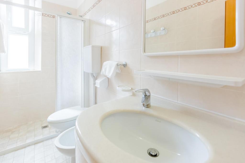 Koupelna v ubytování Hotel Bagli
