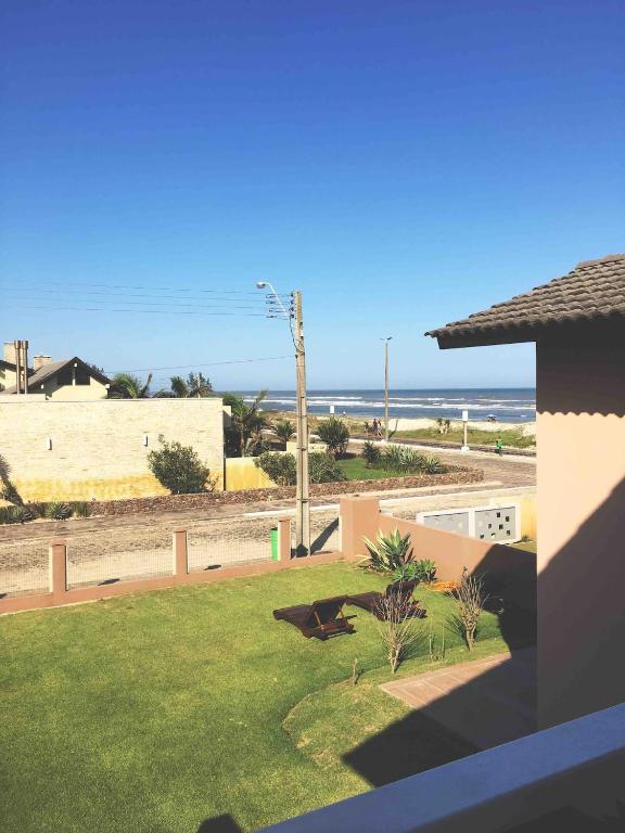  Casa de praia grande com vista para o mar