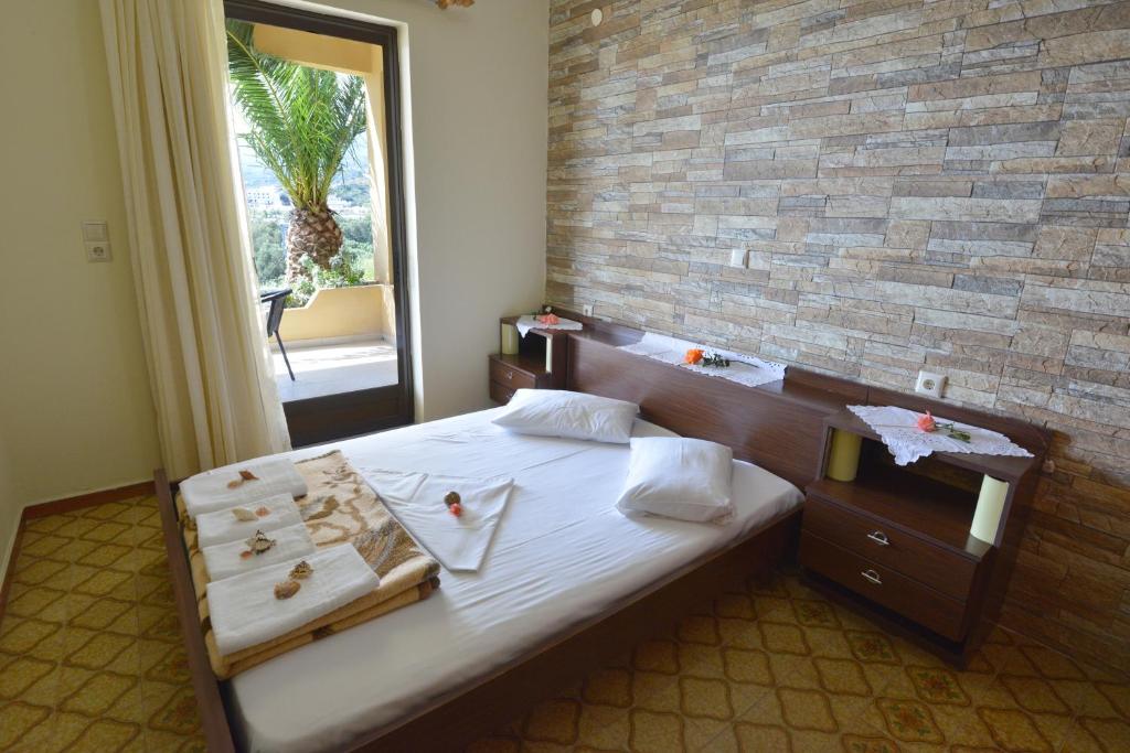 Posteľ alebo postele v izbe v ubytovaní Zambia Apartments