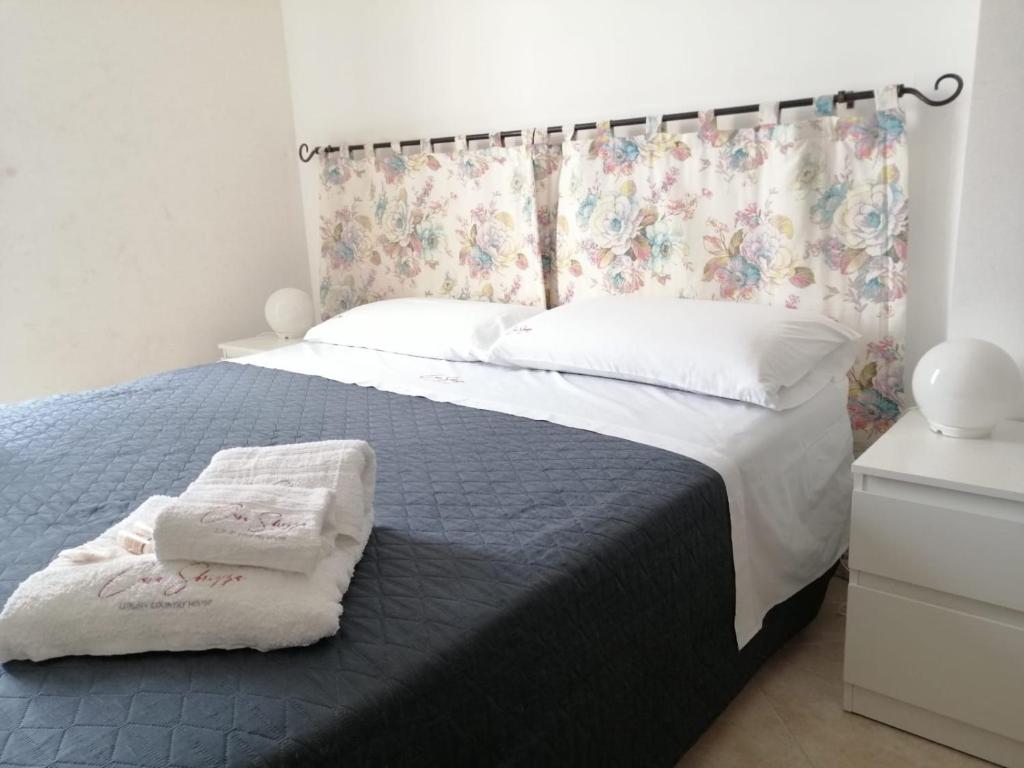 Postel nebo postele na pokoji v ubytování Casa Sbrizza