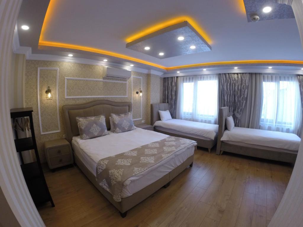 Meydan Suites - Deluxe Quadruple Room