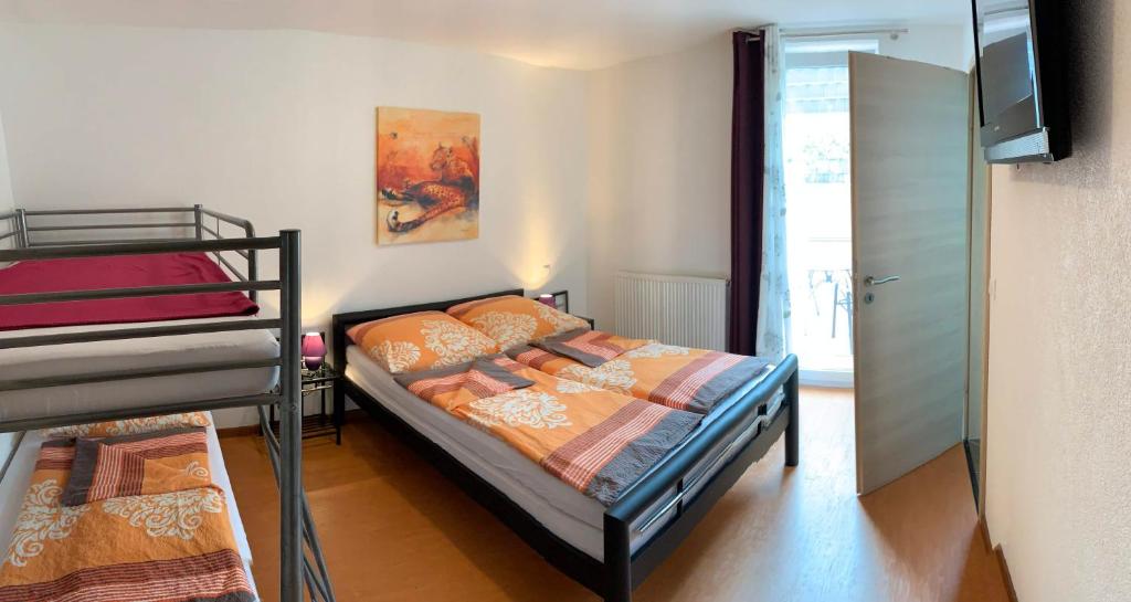Postel nebo postele na pokoji v ubytování Gästehaus Nikita