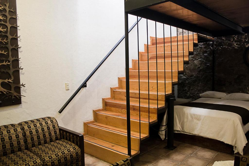 Postel nebo postele na pokoji v ubytování Hotel Suites Sofia