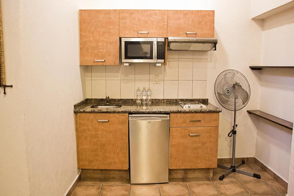 Kuchyň nebo kuchyňský kout v ubytování Hotel Suites Sofia