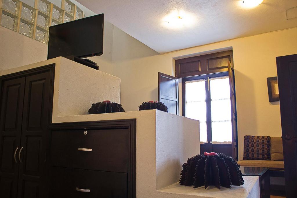 TV a/nebo společenská místnost v ubytování Hotel Suites Sofia