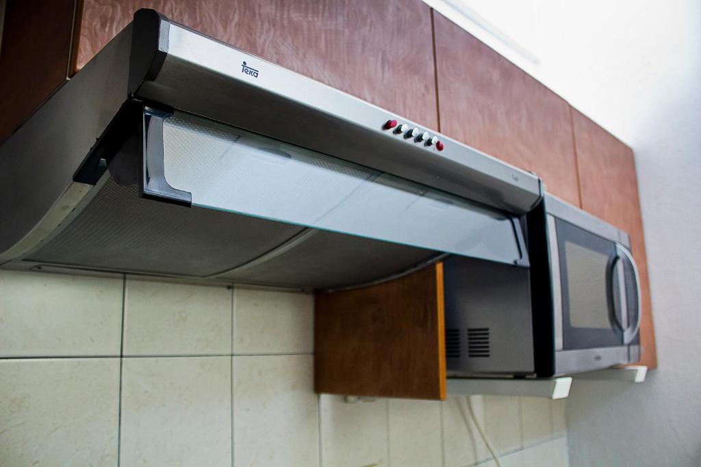 Kuchyň nebo kuchyňský kout v ubytování Hotel Suites Sofia
