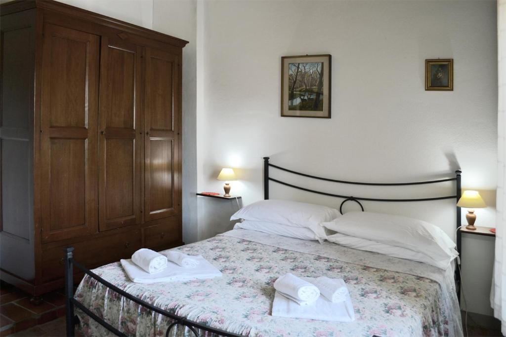 Postel nebo postele na pokoji v ubytování Casalgallo