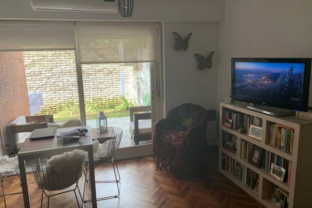 TV/trung tâm giải trí tại Espectacular departamento en el corazón de Martinez