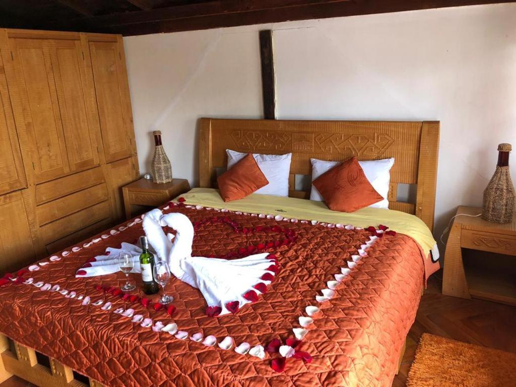 Postel nebo postele na pokoji v ubytování Hosteria San Jose de Sigchos