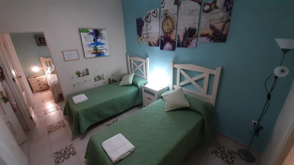 Cama o camas de una habitación en Pension Internacional