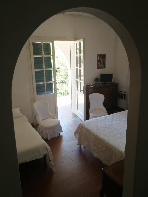Postel nebo postele na pokoji v ubytování Hotel Villa Furia