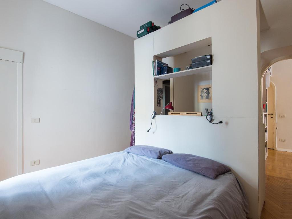 Łóżko lub łóżka w pokoju w obiekcie Coronari Enchanting Two Bedroom