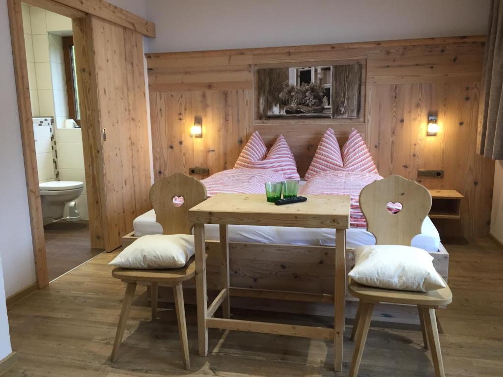 A bed or beds in a room at "Adamerhof"