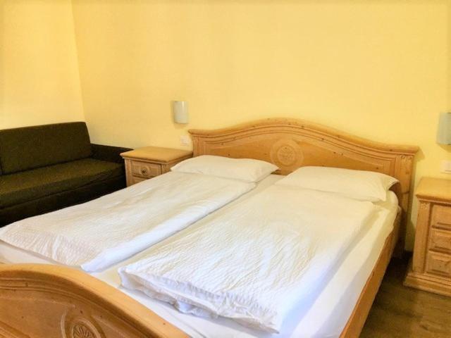 Postel nebo postele na pokoji v ubytování Appartamenti Sissi