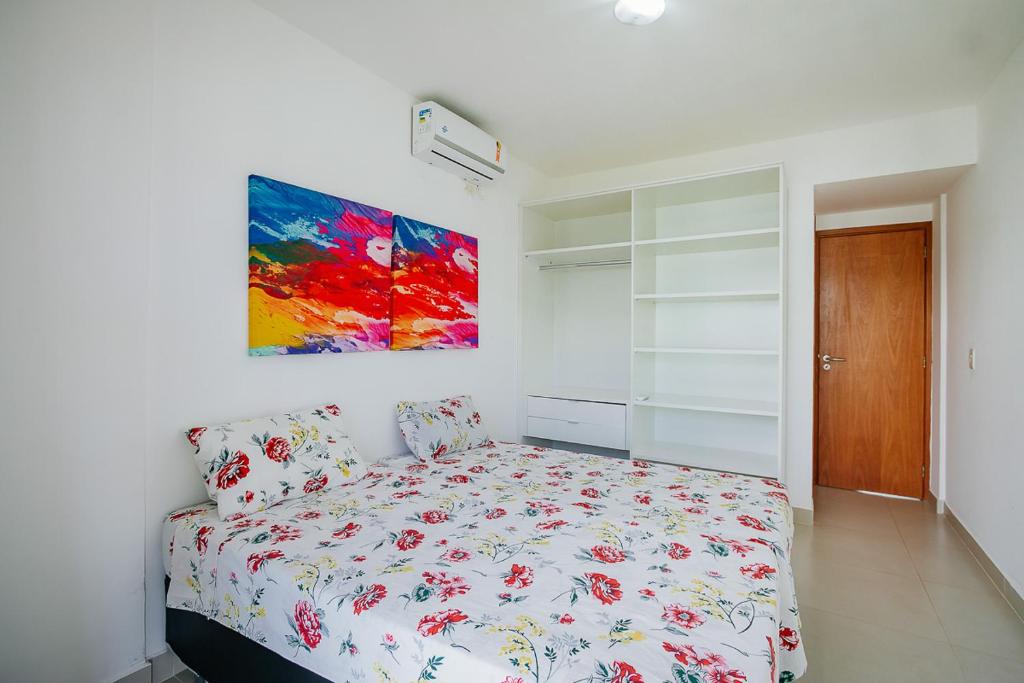 Postel nebo postele na pokoji v ubytování Areias de Itacimirim