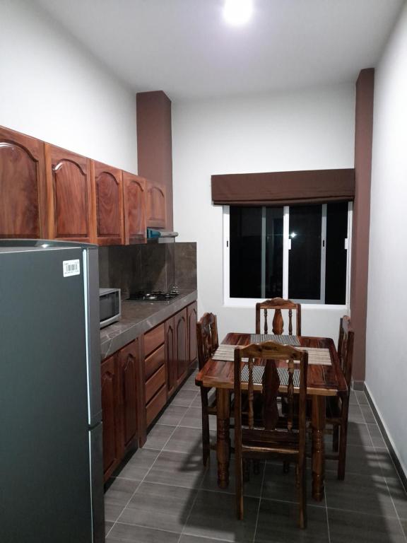 Kuchyň nebo kuchyňský kout v ubytování Grand View Suites