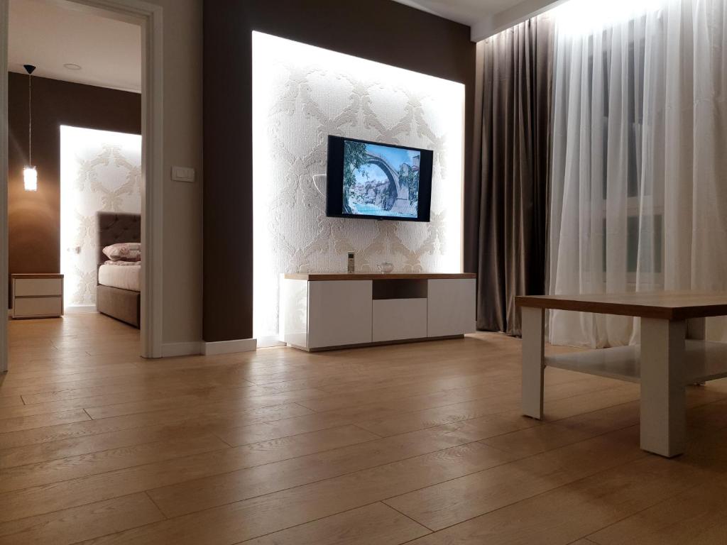 TV a/nebo společenská místnost v ubytování Apartments Solis