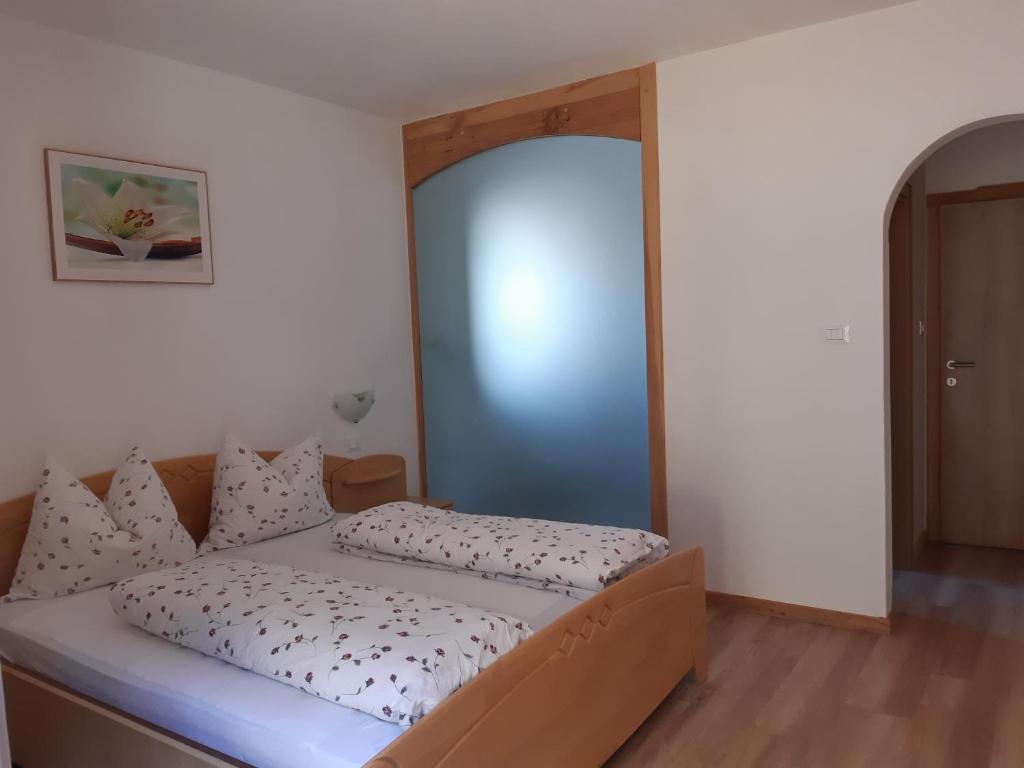 Postel nebo postele na pokoji v ubytování Stuberhof