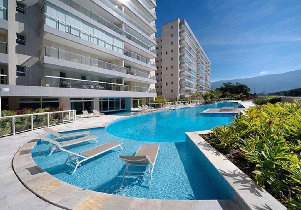  Apto excelente em frente ao mar em Resort - Bertioga