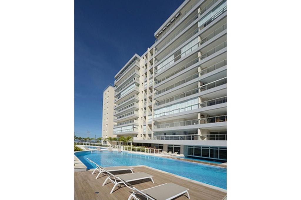  Apartamento de Frente ao Mar em Bertioga - Comodidade e Lazer