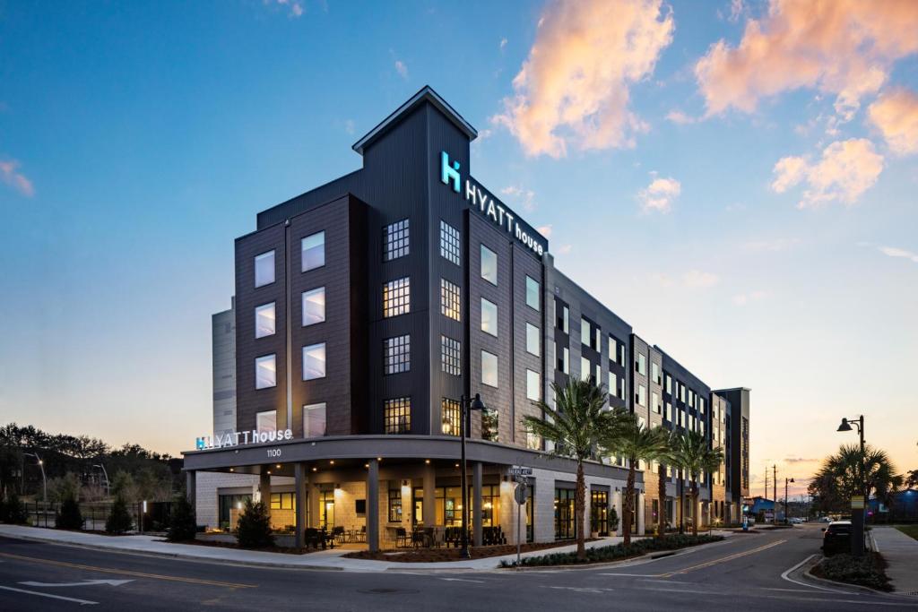 a tall black building with a sign on it at Hyatt House Tallahassee Capitol University in Tallahassee