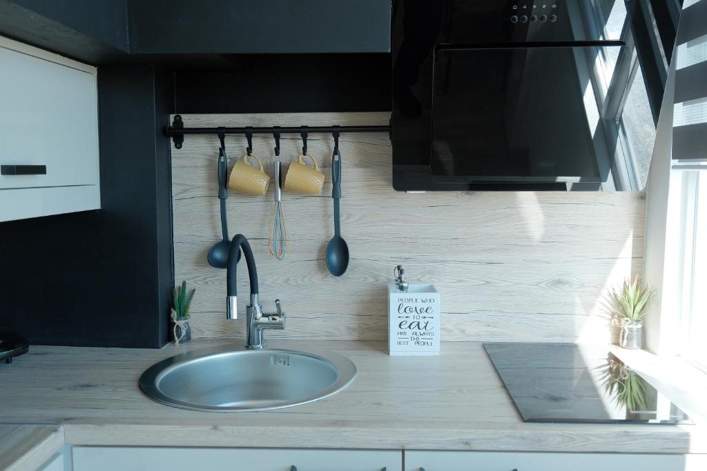Kuchyňa alebo kuchynka v ubytovaní Apartmani Donata