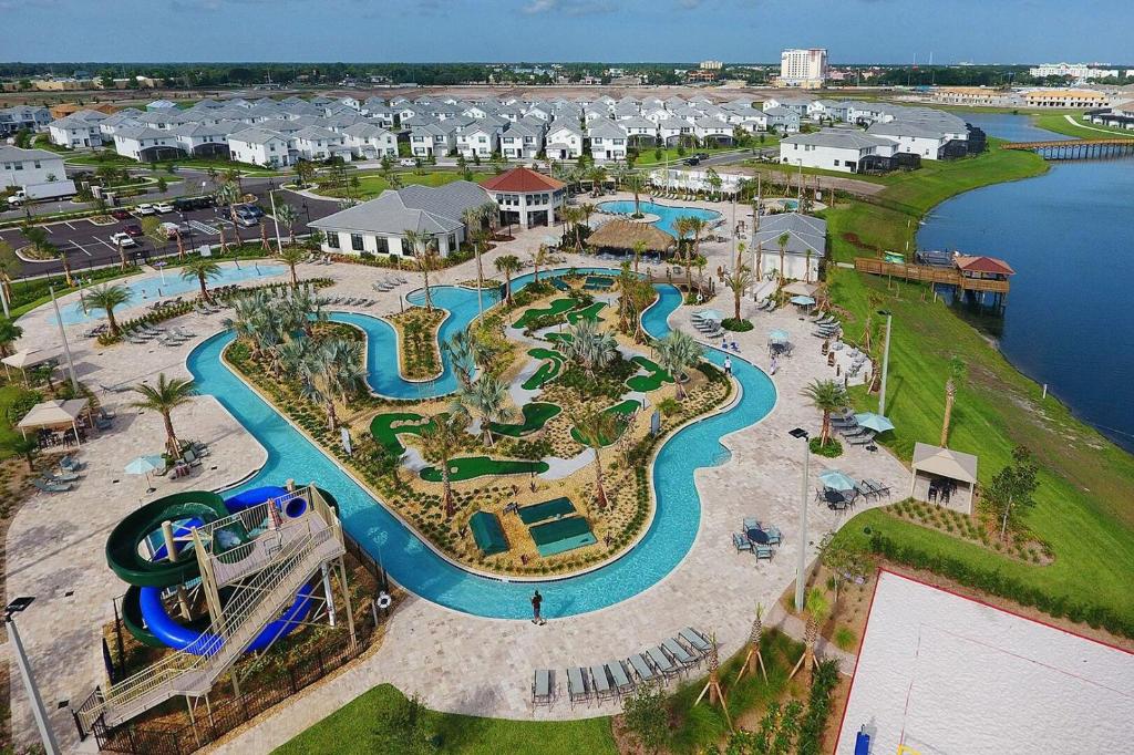 an aerial view of a water park with a water slide at Modern Luxury Villa with Everything in Kissimmee