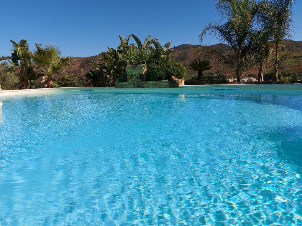 The swimming pool at or close to La Suite Di Segesta