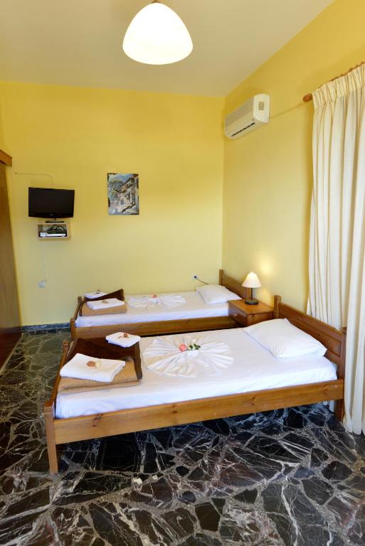 Posteľ alebo postele v izbe v ubytovaní Zambia Apartments