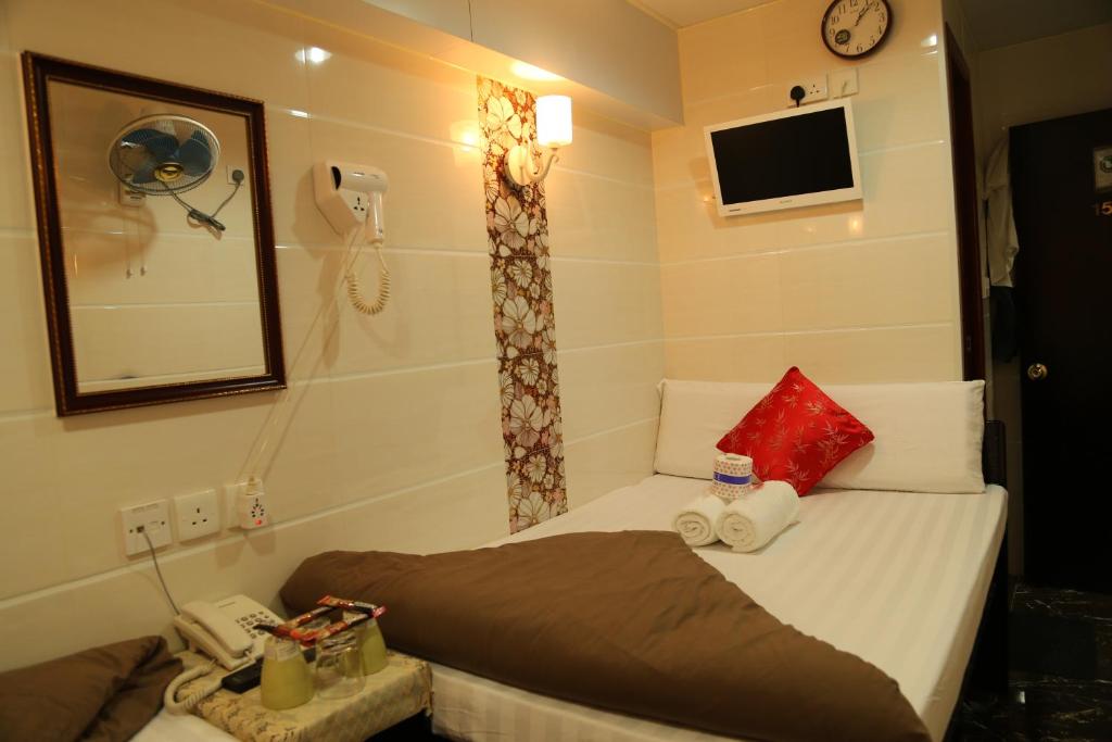 Postel nebo postele na pokoji v ubytování New Tokyo Hostel